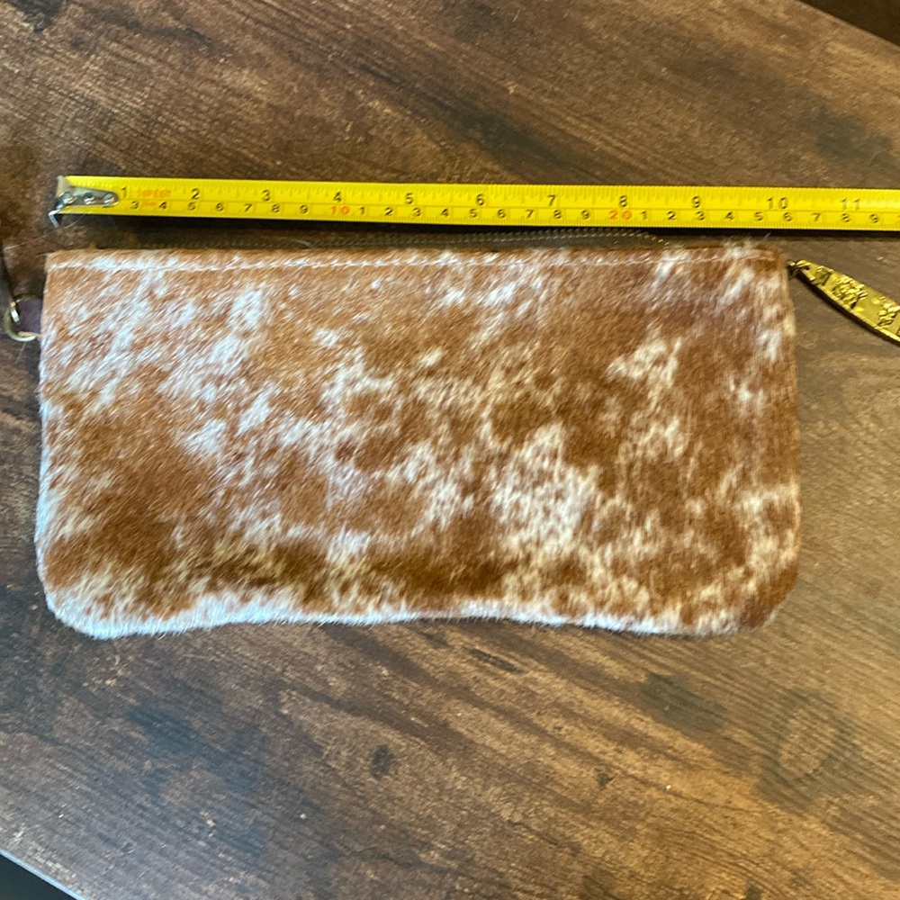 Canoe leather and calf hair wristlet
